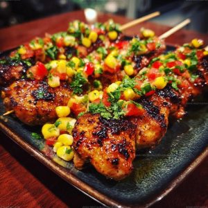 7988581 Sticky Garlic Chicken Skewers With Summer Corn Salsa Recipe
